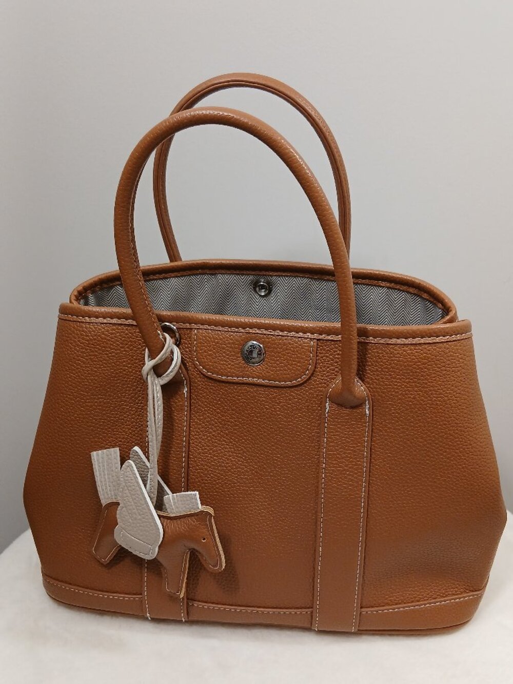 Caitina Brown Pebbled Leather Tote & Crossbody Bag with Pegasus Charm